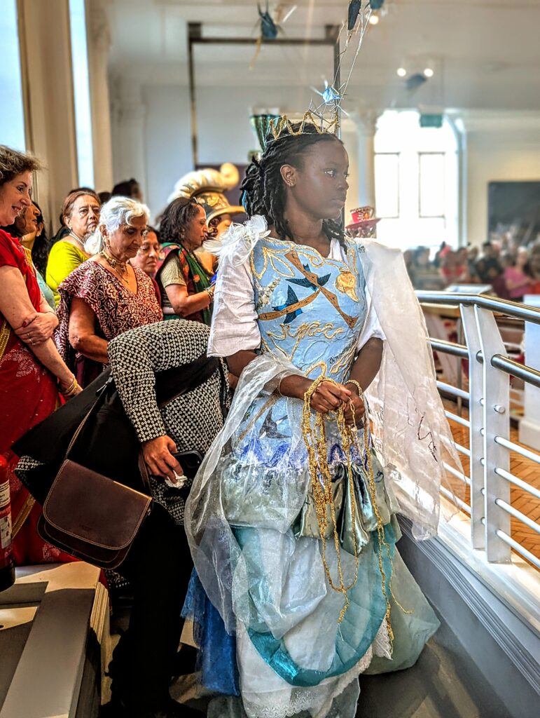 Our group made this costume. Model holds chains/ropes in her hands. They depict the things which we seek freedom from.