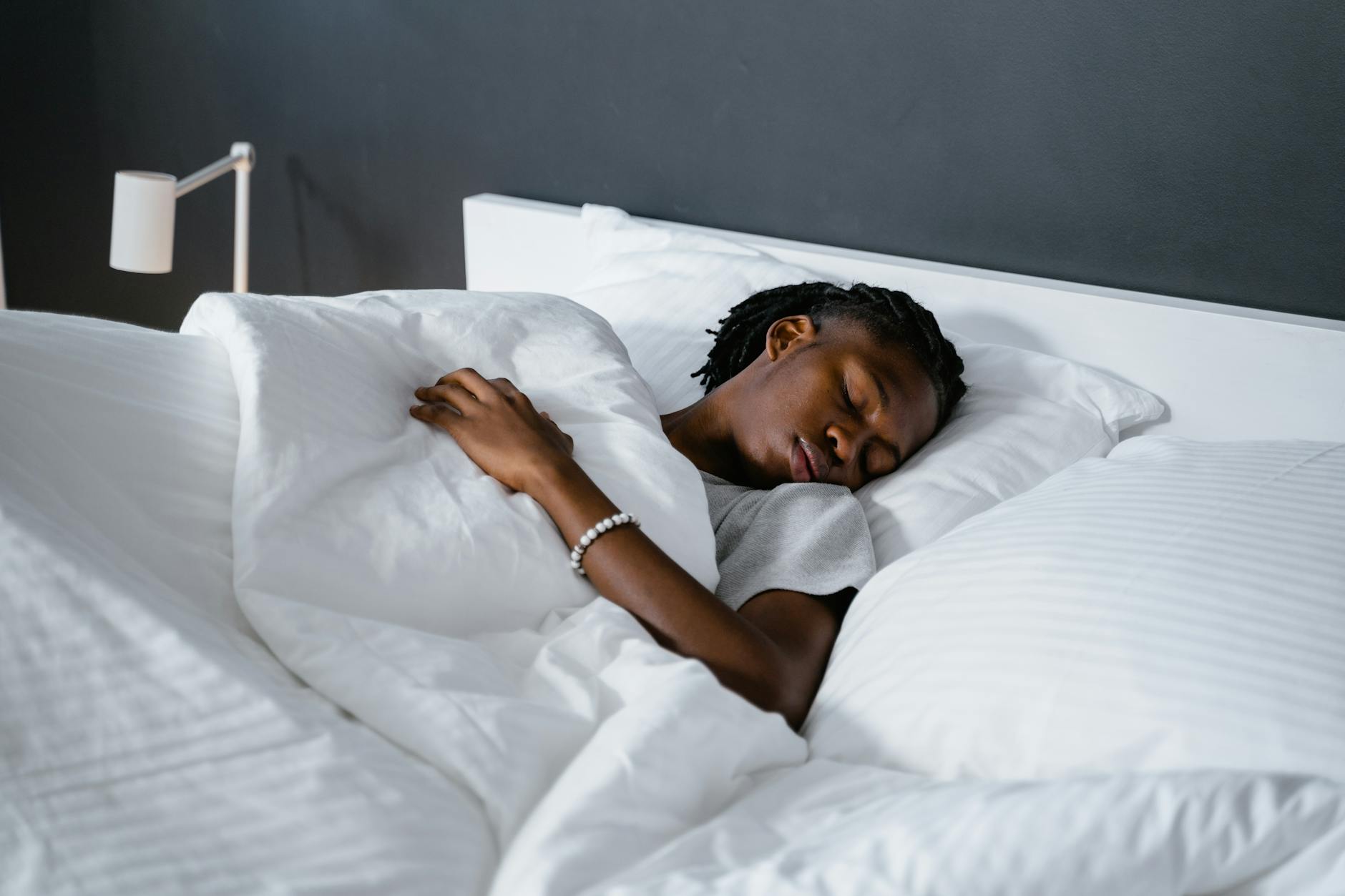 a man sleeping on the bed