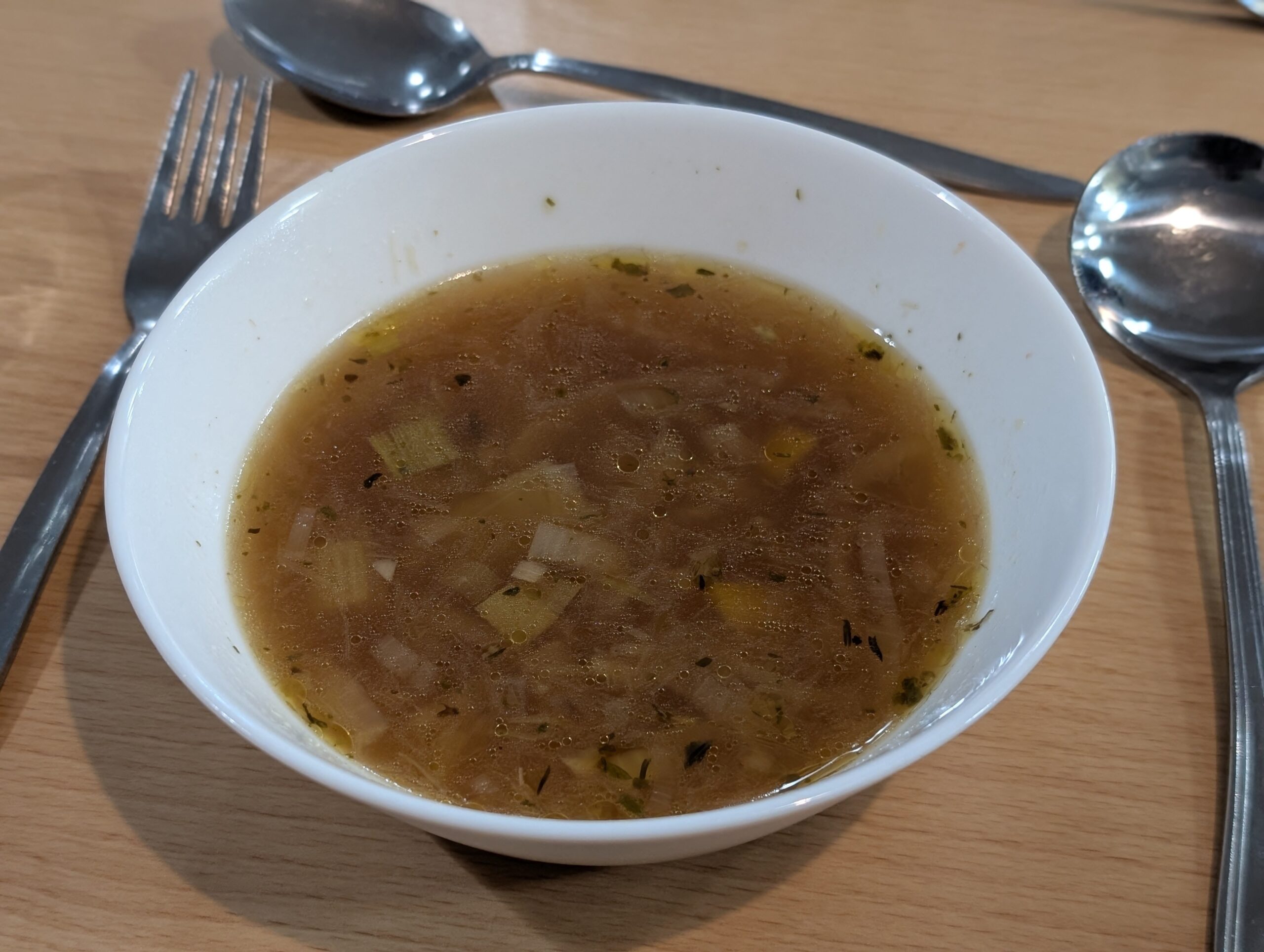 This first course of tasty onion soup was served with bread