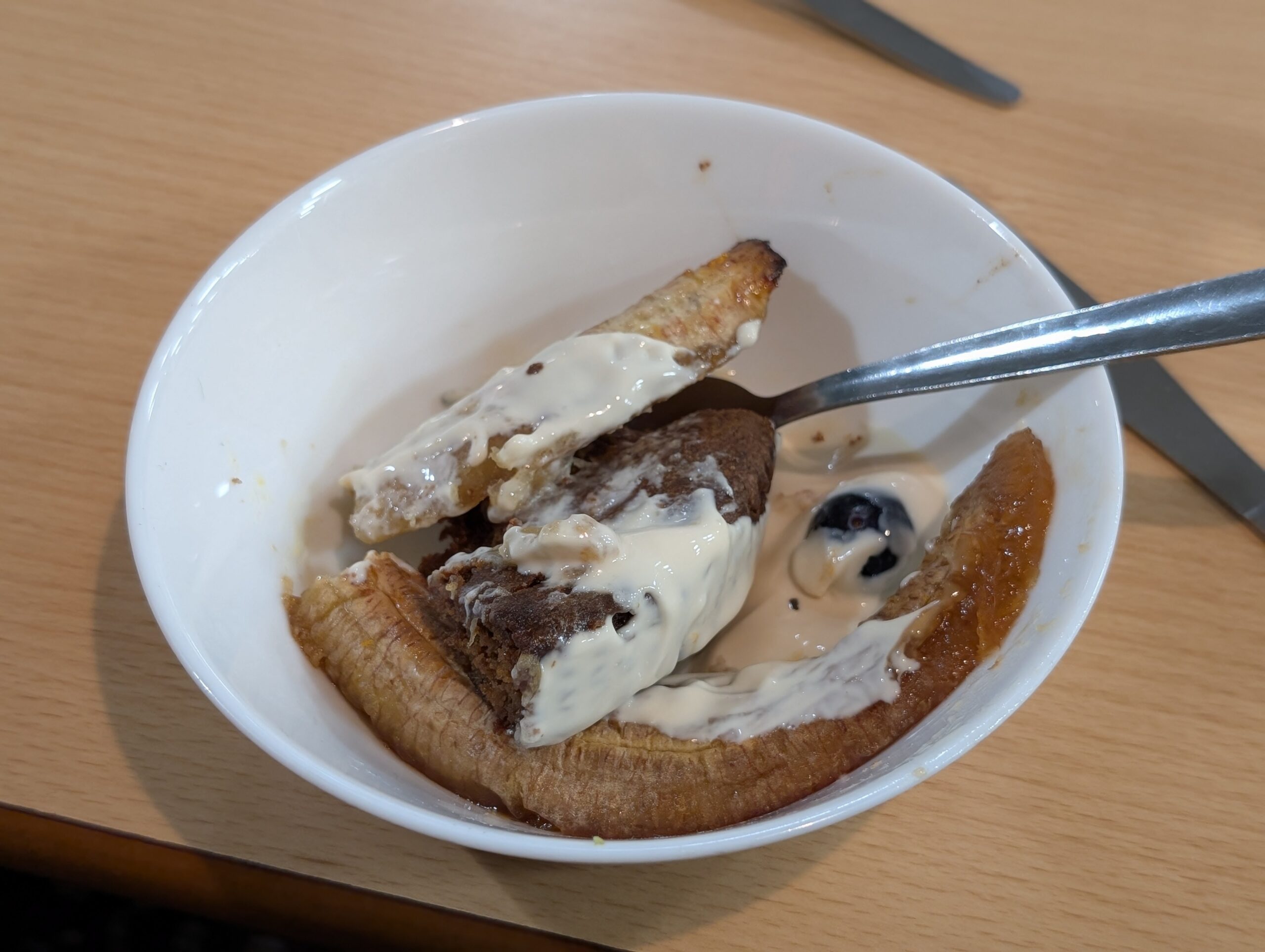 Dessert = caramelised banana, blueberries, choc muffins, yoghurts and cream.